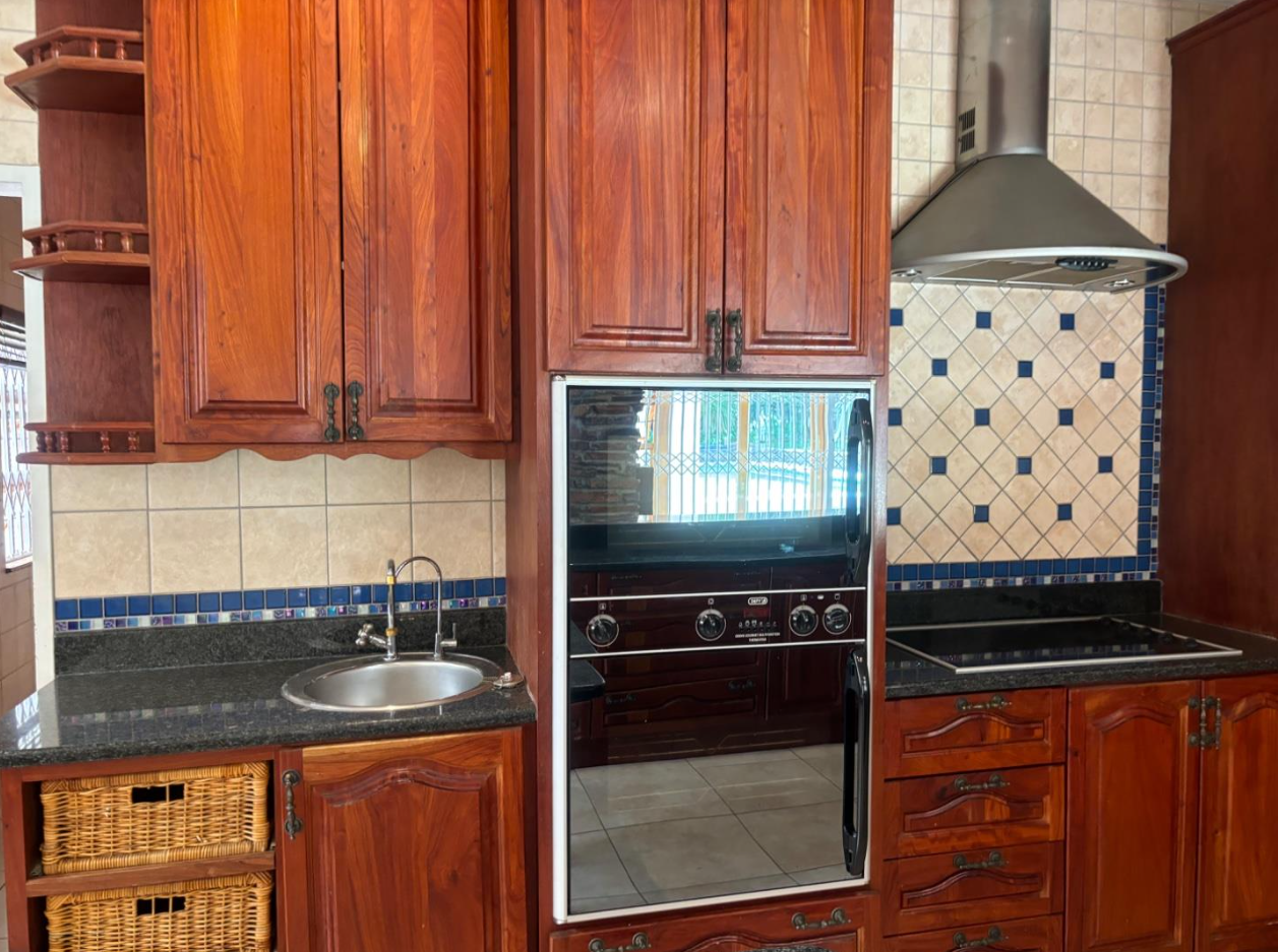 Well-maintained family home with large flatlet